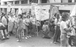 Women with banners at a rally supporting the 1984/85 miners' strike