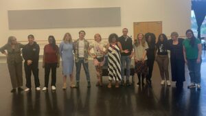 The Red Ladder writers in Phoenix Dance studios smiling in a line.